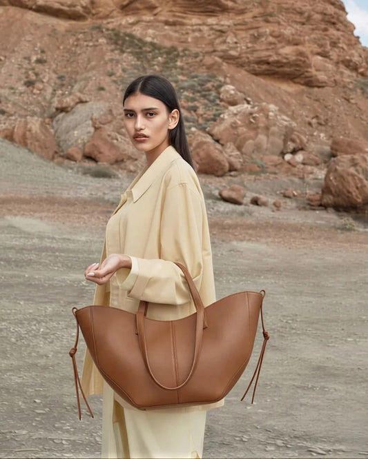 Woman carrying Caramel Flow Brown Bag — Luxury Shoulder Tote Bag Pakistan | MYLIGHT.PK