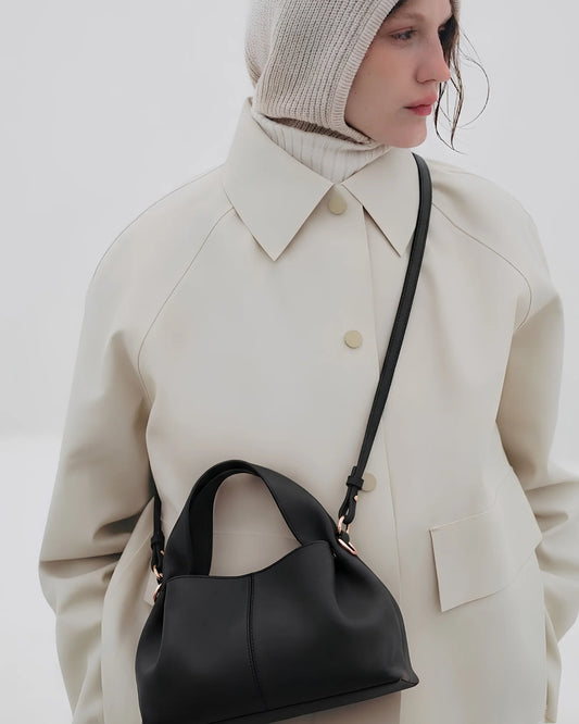 Woman carrying The Haven Black Bag — Premium Shoulder Bag Pakistan | MYLIGHT.PK